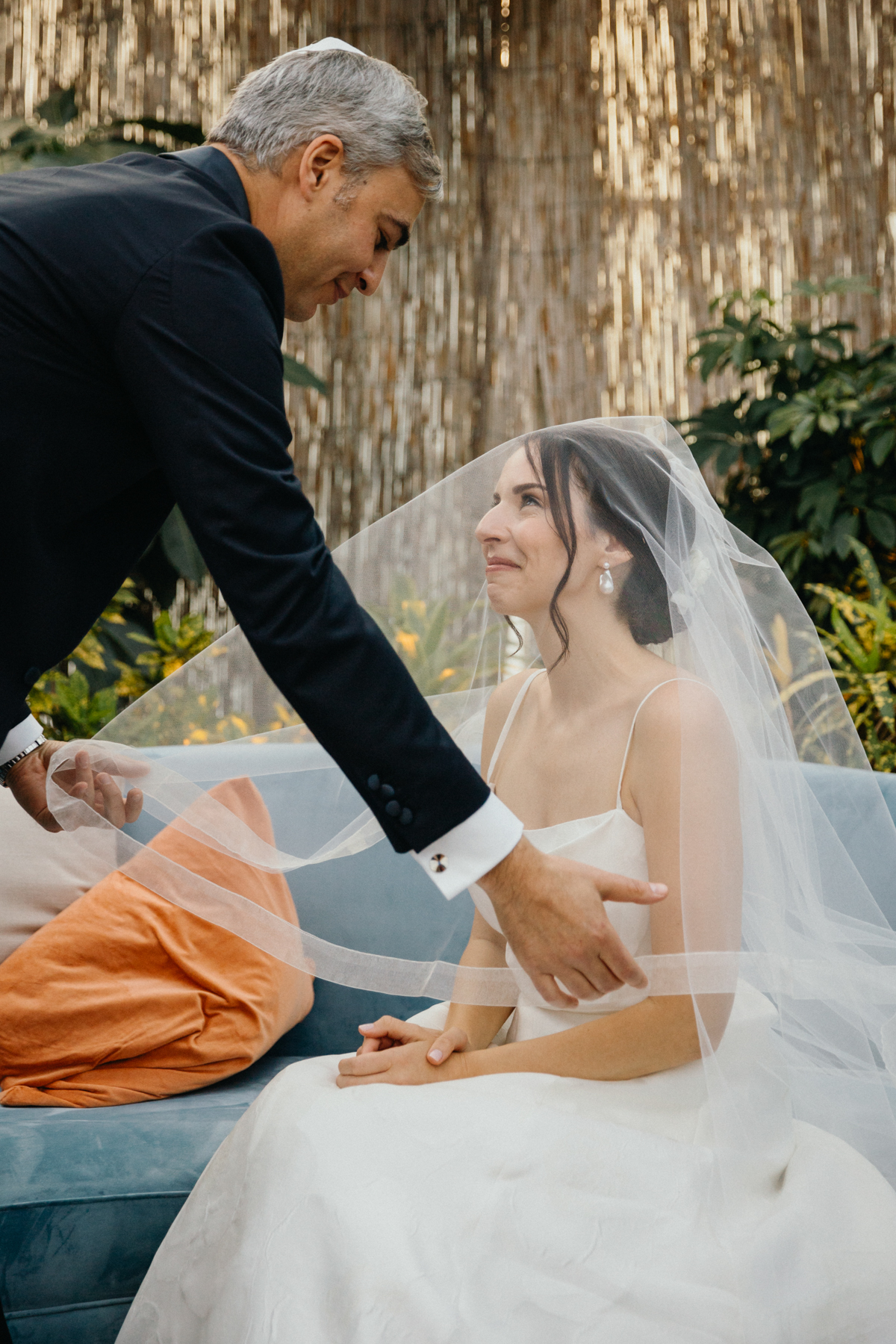 Groom and bride meeting for the first time at the badeken