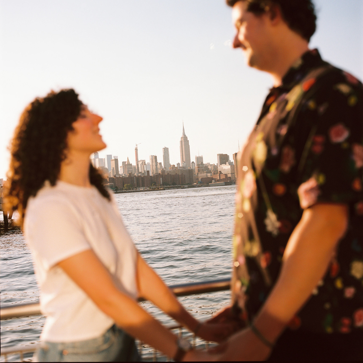 Wedding film photographer in Philadelphia documenting a couple’s playful moments in Brooklyn.