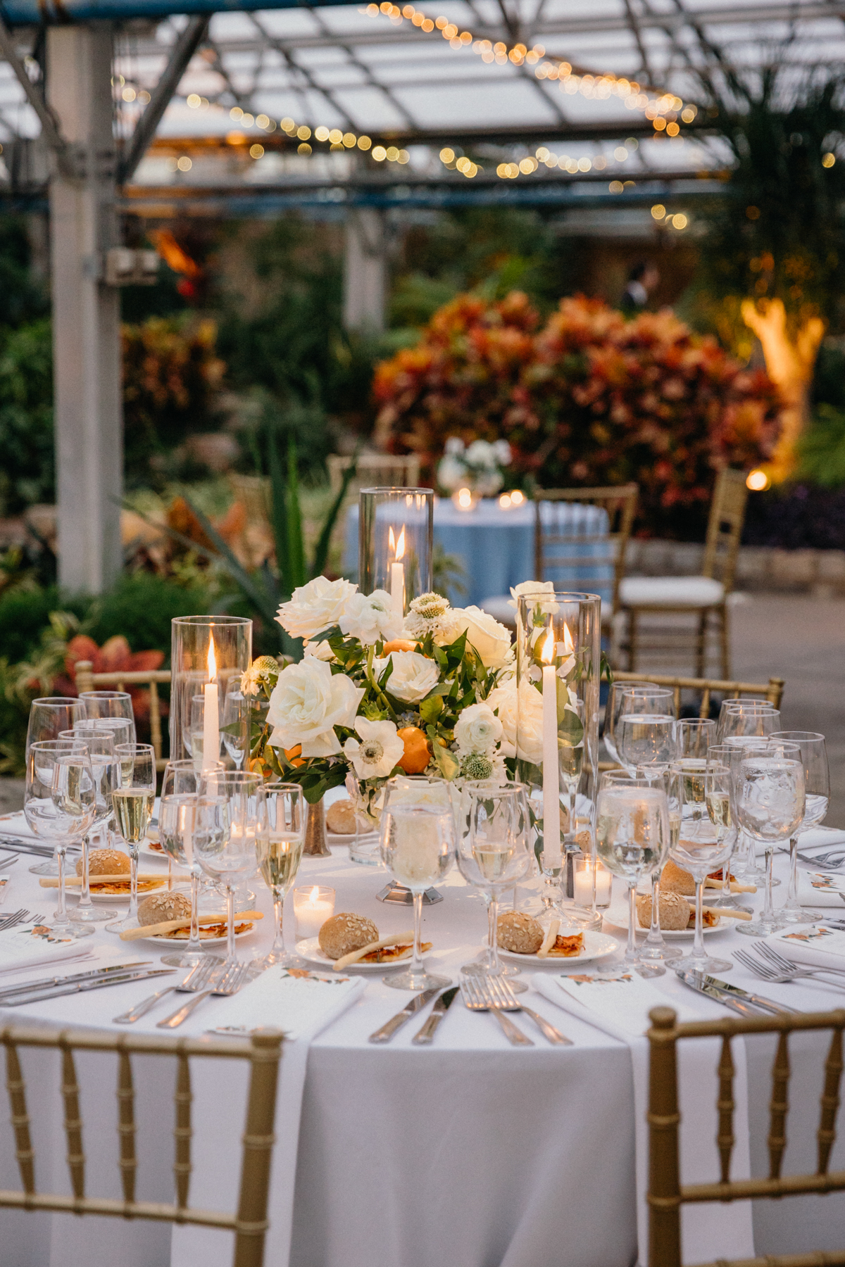 Elegant tablescape for a greenhouse wedding reception in Fairmount Park