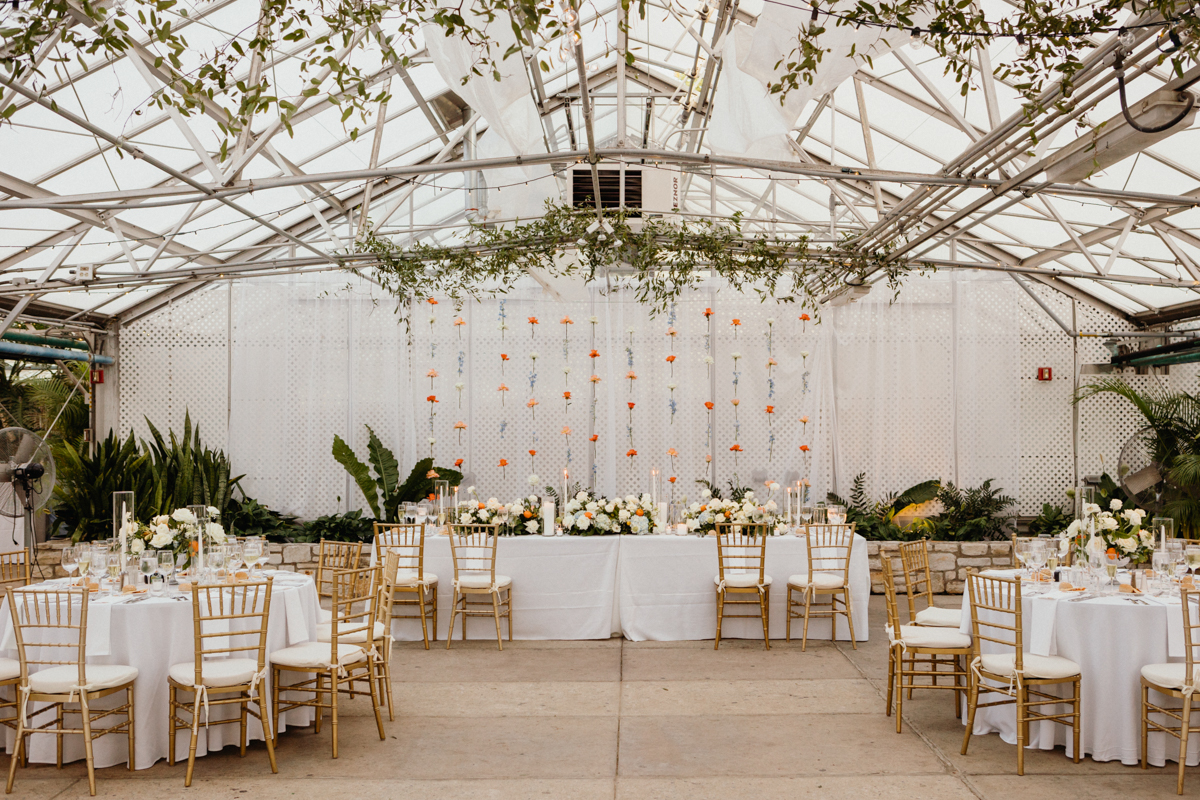 Reception setup under the glass ceiling at the Horticulture Center in Philadelphia