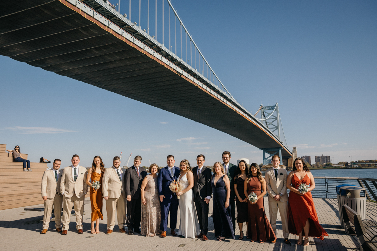 Wedding portraits with Ben Franklin Bridge in the background