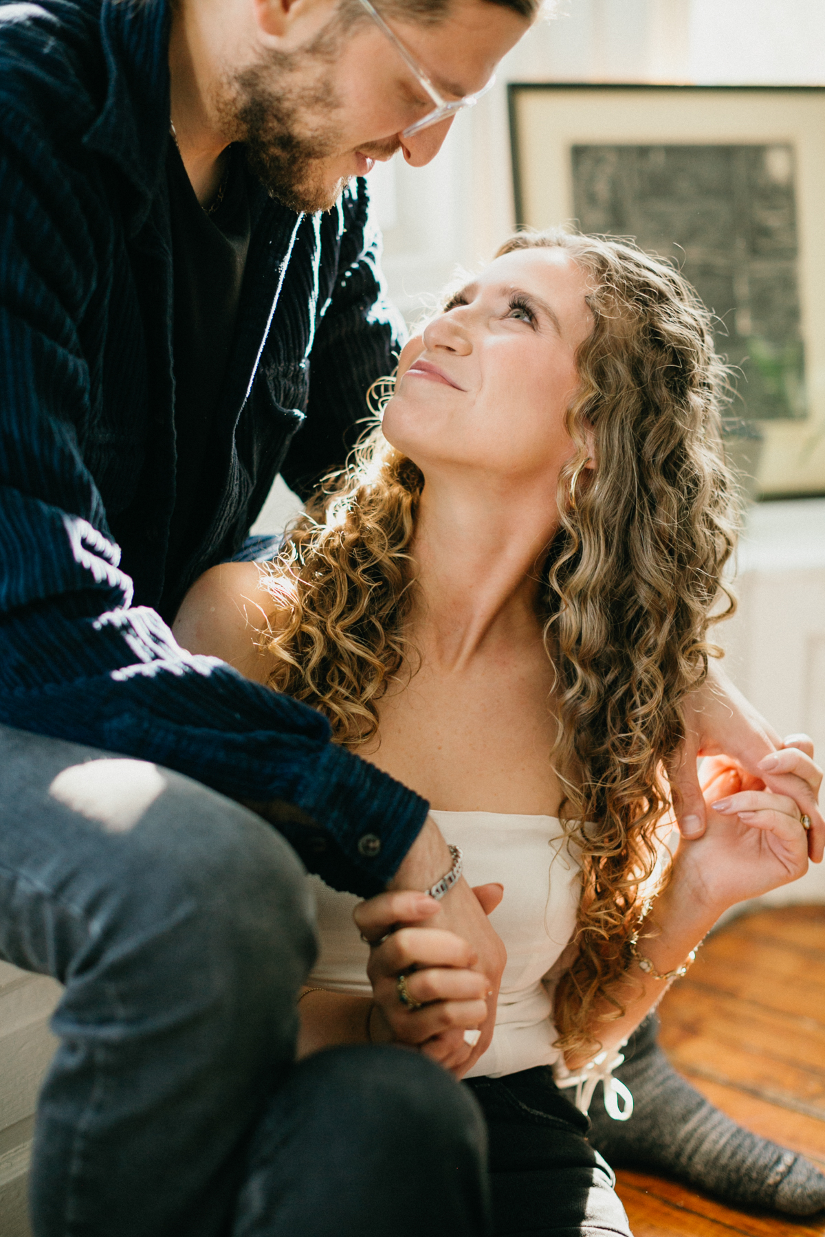 Candid indoor couples photo in natural light