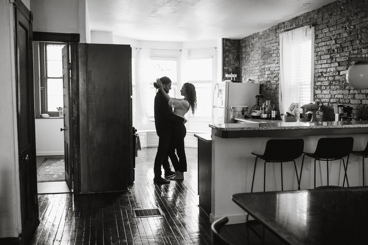 Natural light photo of couple enjoying morning rituals together