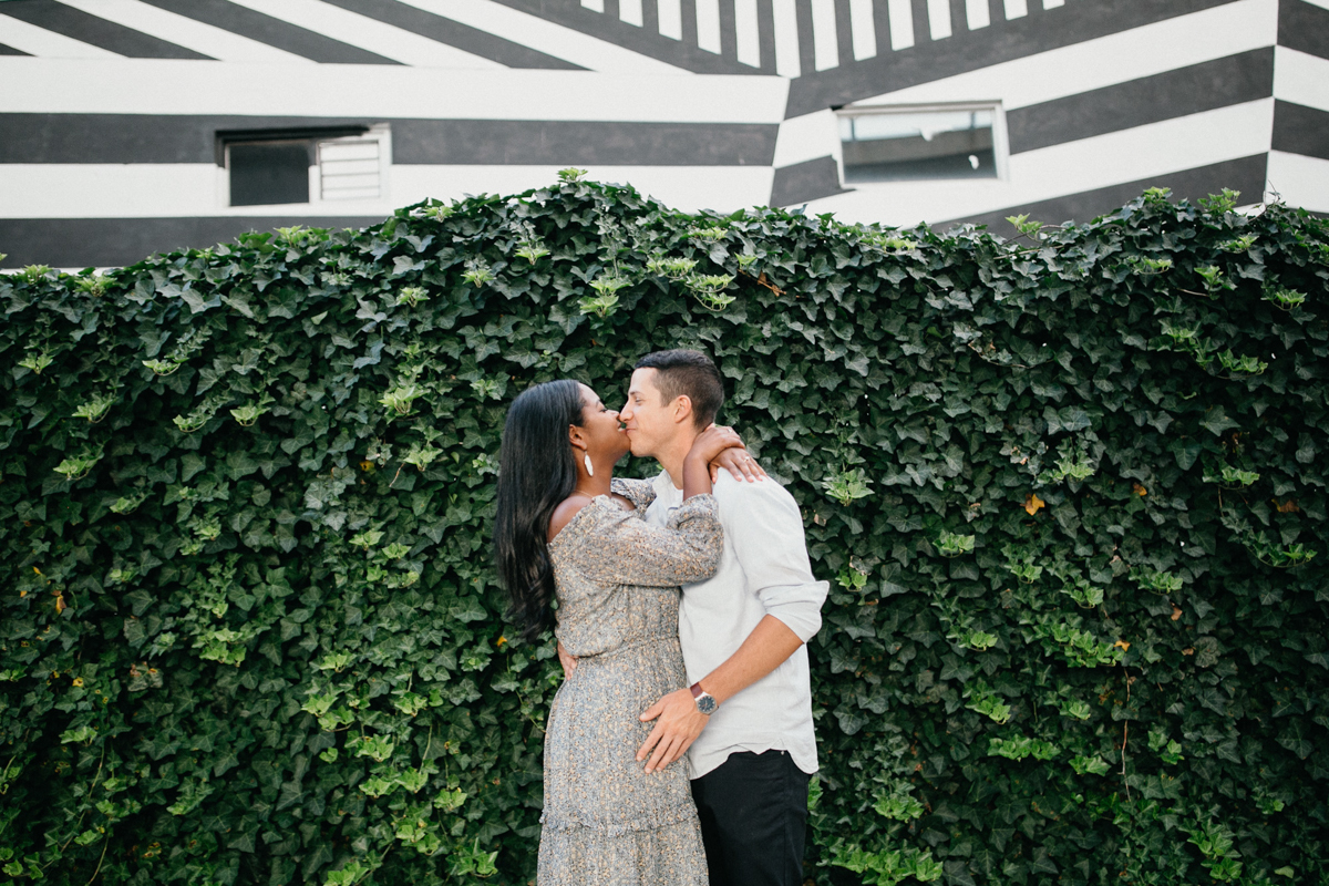 Couple exploring murals in Fishtown during Philly engagement session