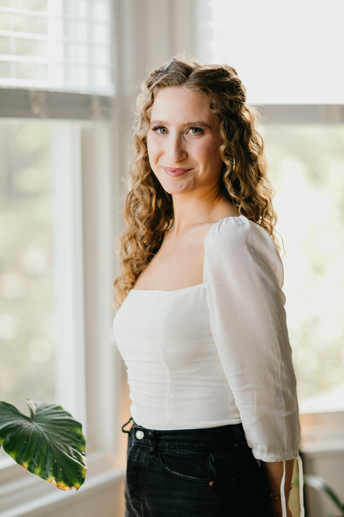 Elegant indoor engagement portrait captured in couple’s home