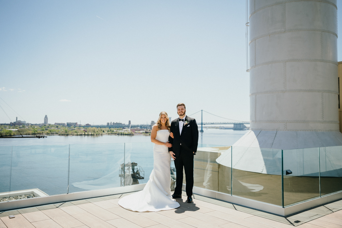 Switch House wedding photo showing bride and groom embracing in modern venue space, waterfront wedding venue in Philadelphia
