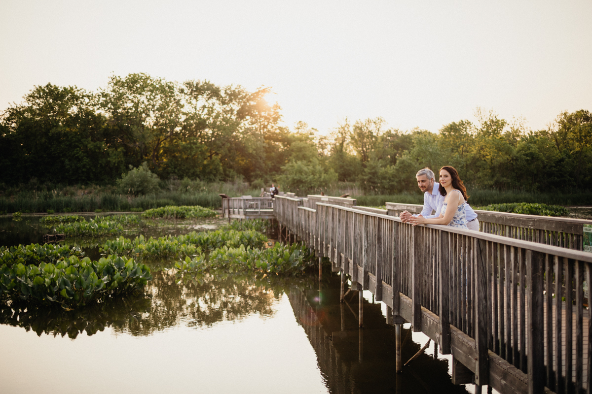 Couple standing near birdwatching deck at Heinz engagement session