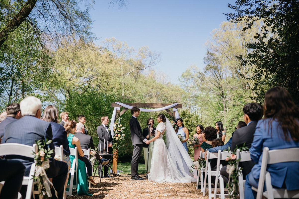 Greenery backdrop for Portico vows