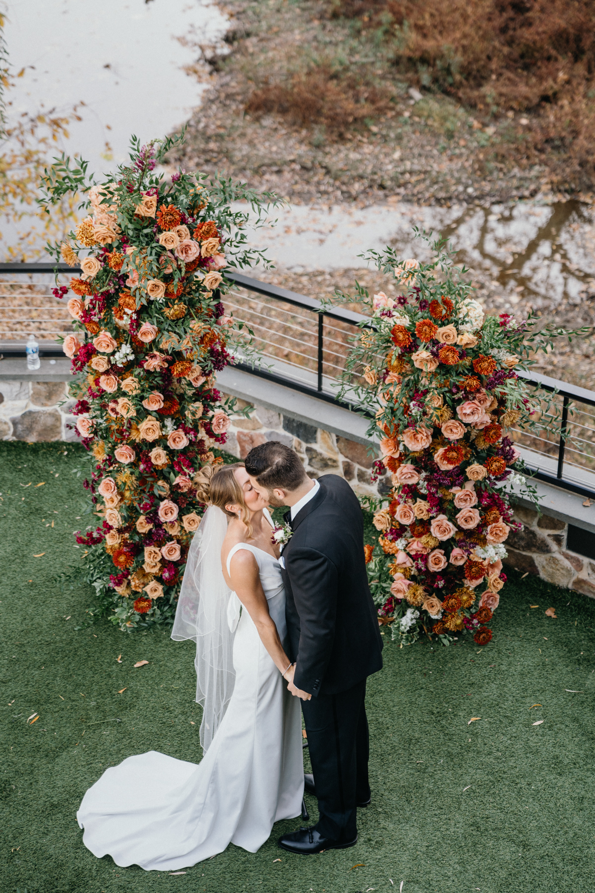 outdoor vows at river house at odettes