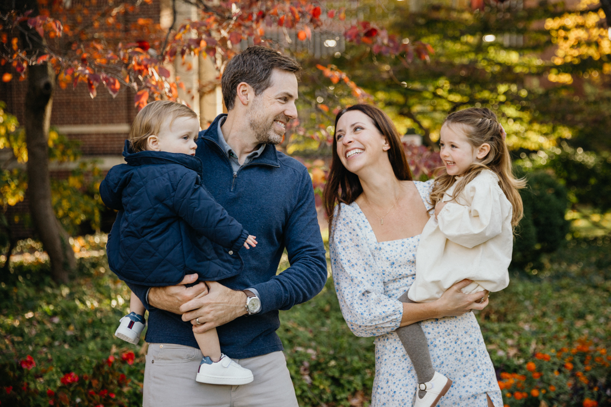 Philadelphia family photographer capturing portraits in fall leaves