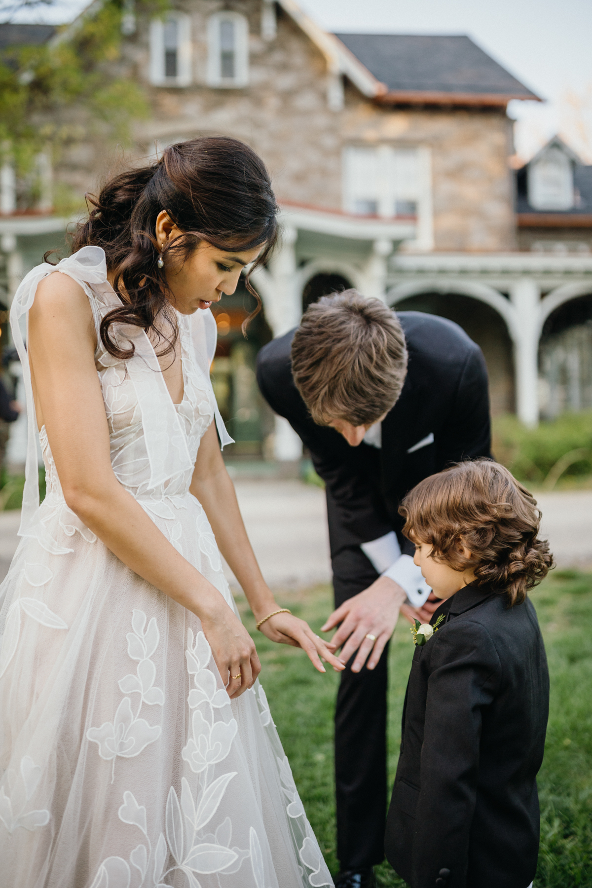 candid wedding moment portico