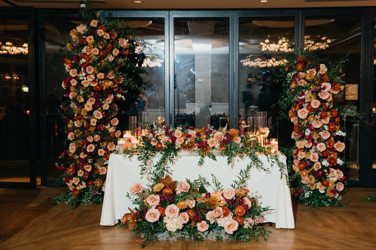 sweetheart table at odettes fall wedding