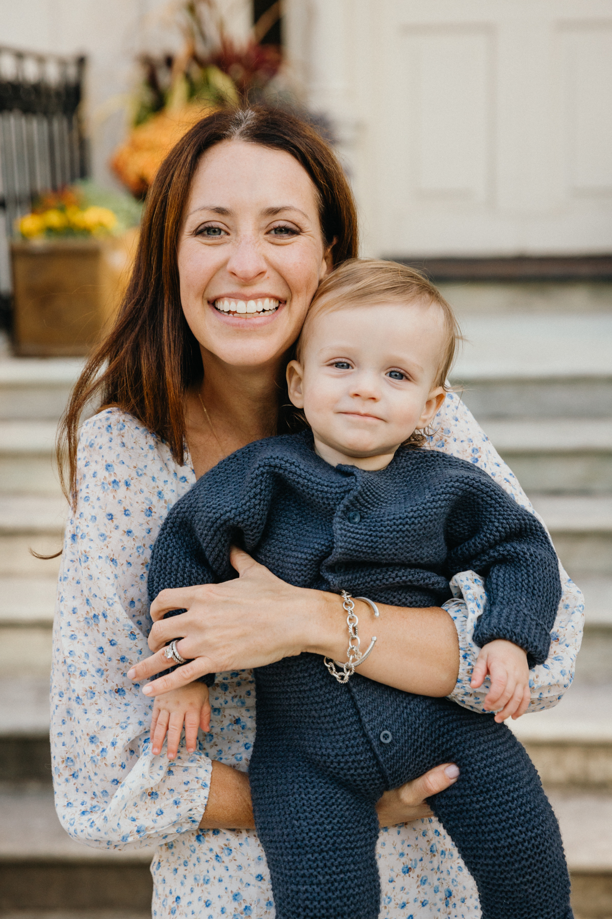 Family photographer in Philadelphia capturing playful garden portraits