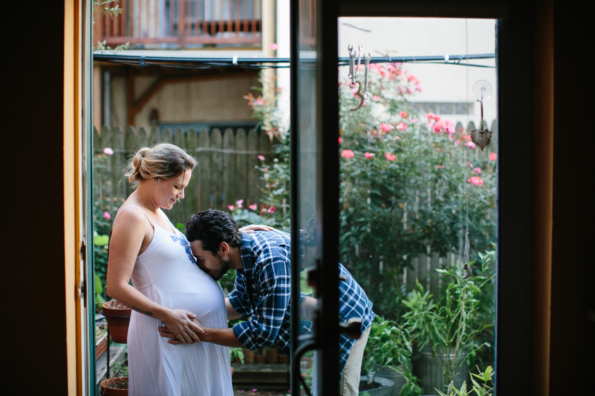 Natural light maternity portraits in garden setting