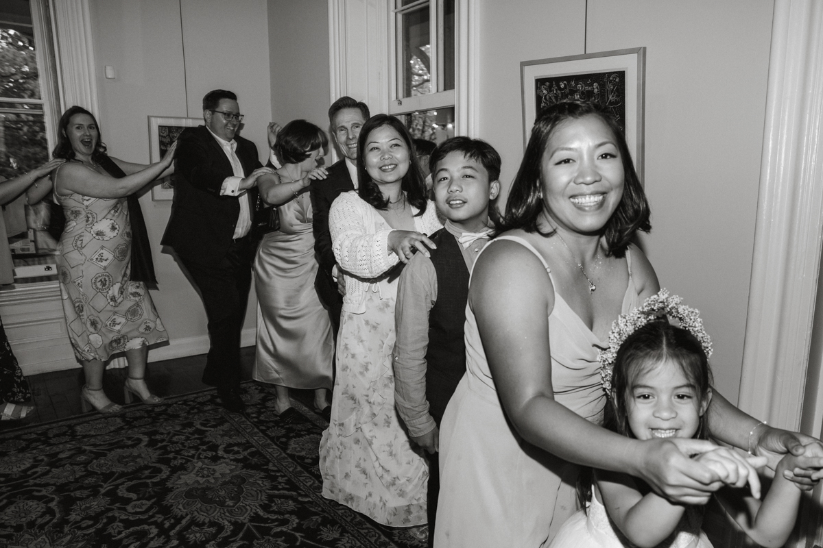 Laughing guests at Philadelphia garden wedding