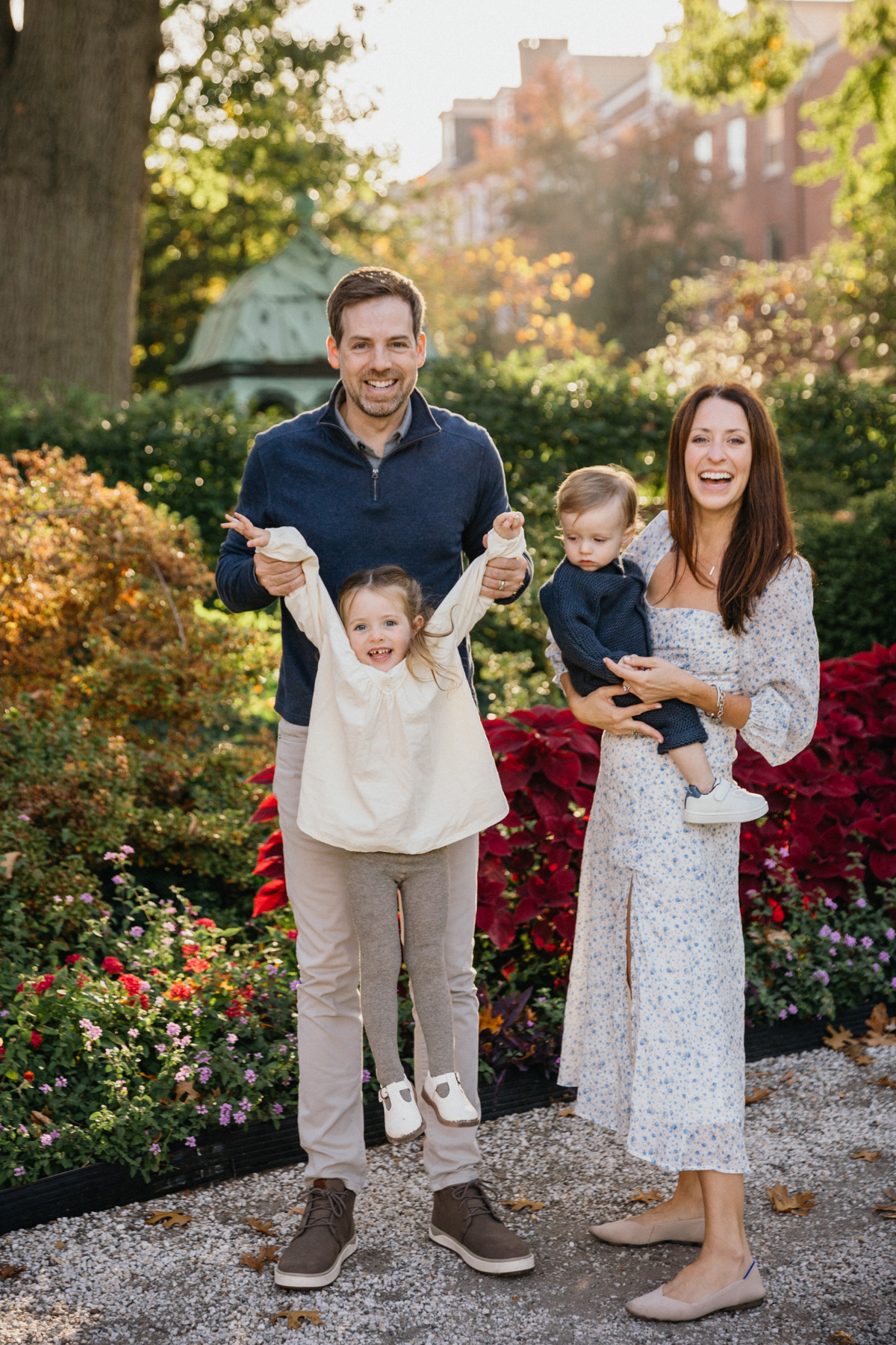 Philly family portraits with golden leaves and evening light
