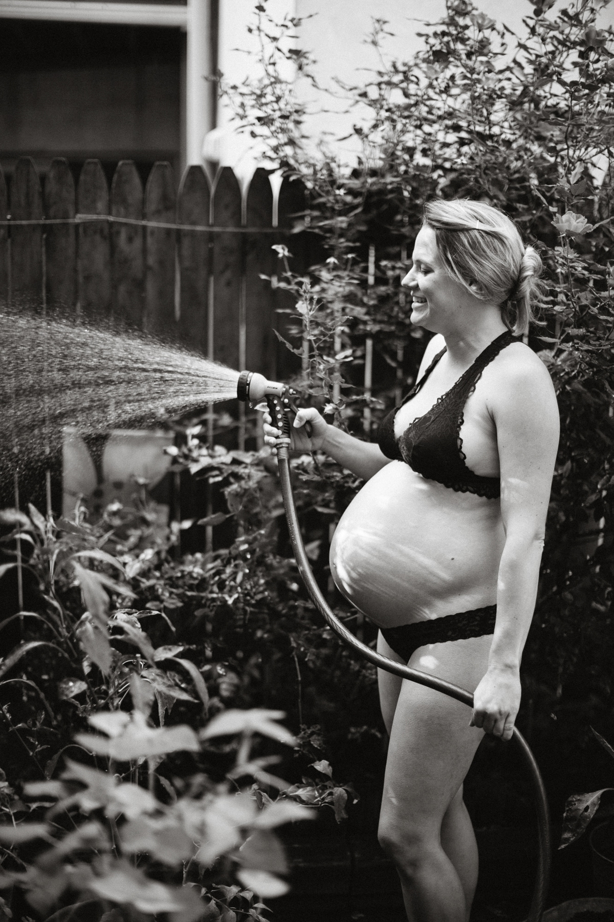 candid maternity photos in garden philadelphia
