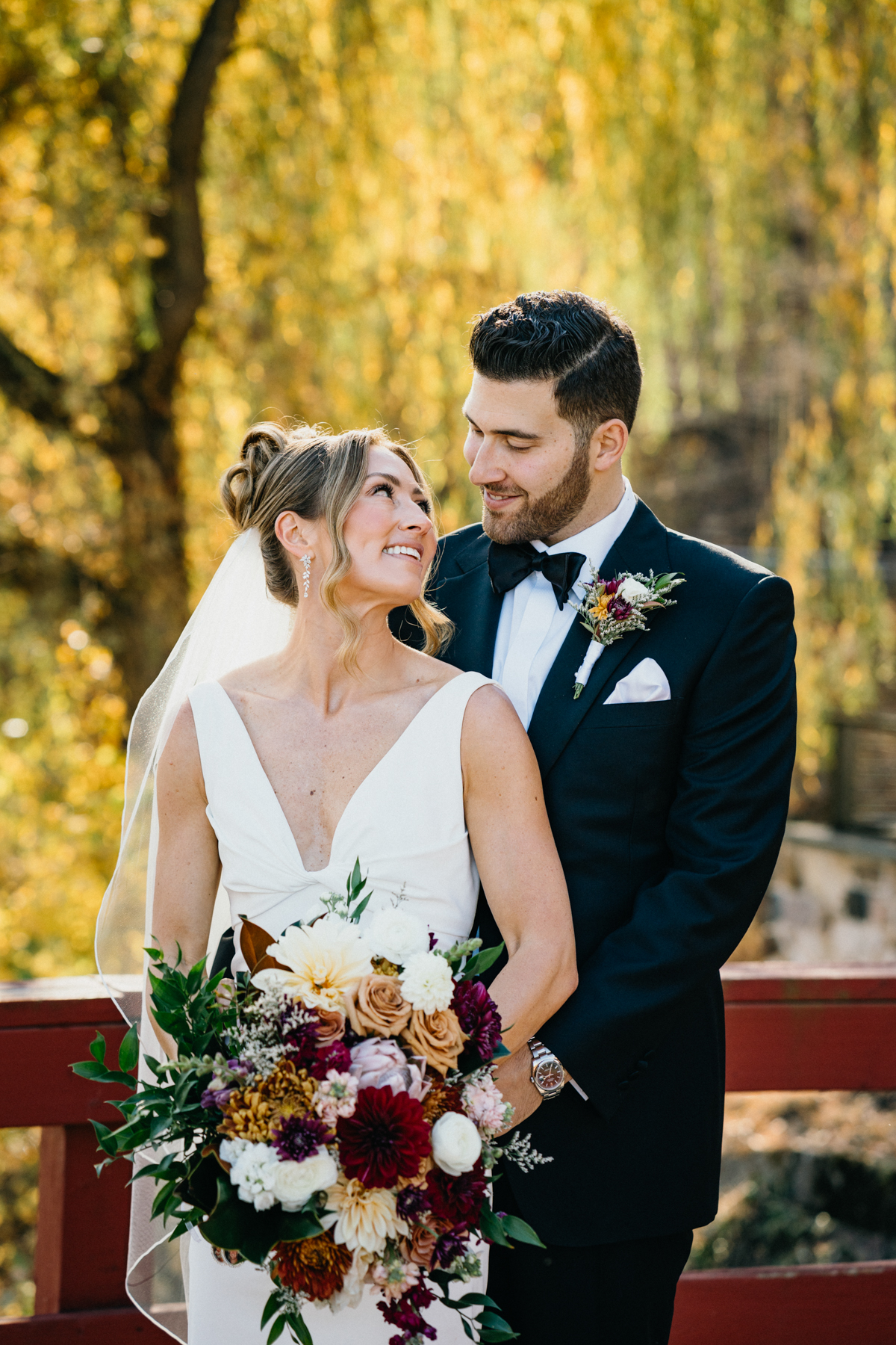 couple portraits at river house at odettes wedding