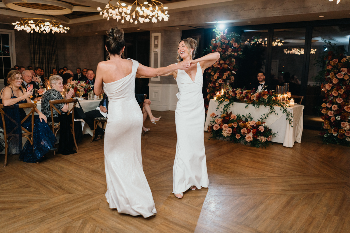 dancing at river house at odettes wedding