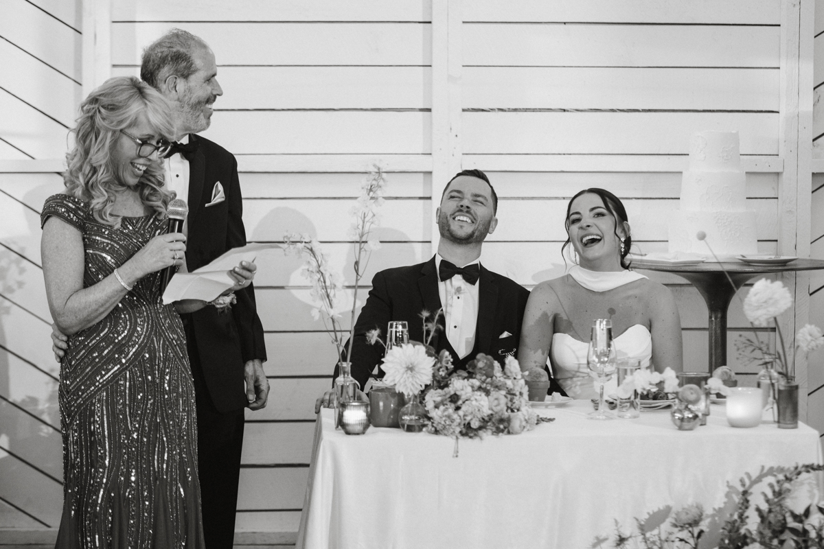 candid moment at Terrain Gardens at DelVal wedding