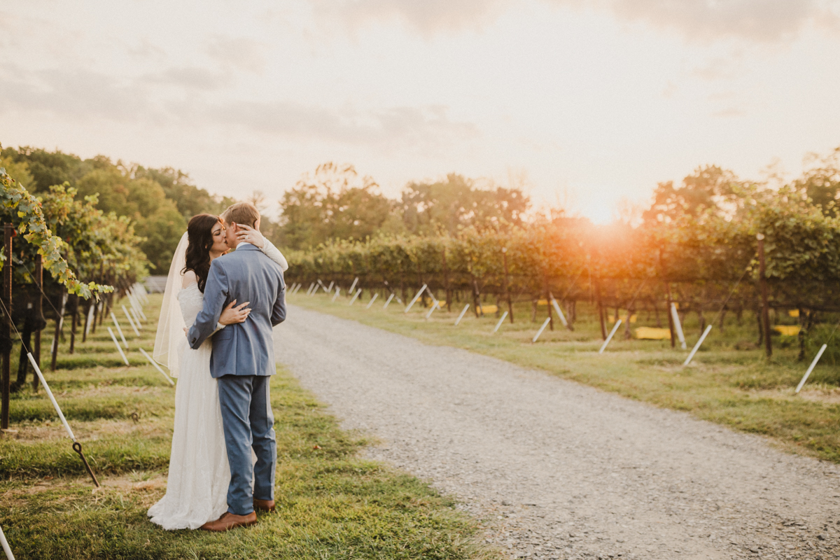 Wedding portraits in the vineyard at Grace Winery
