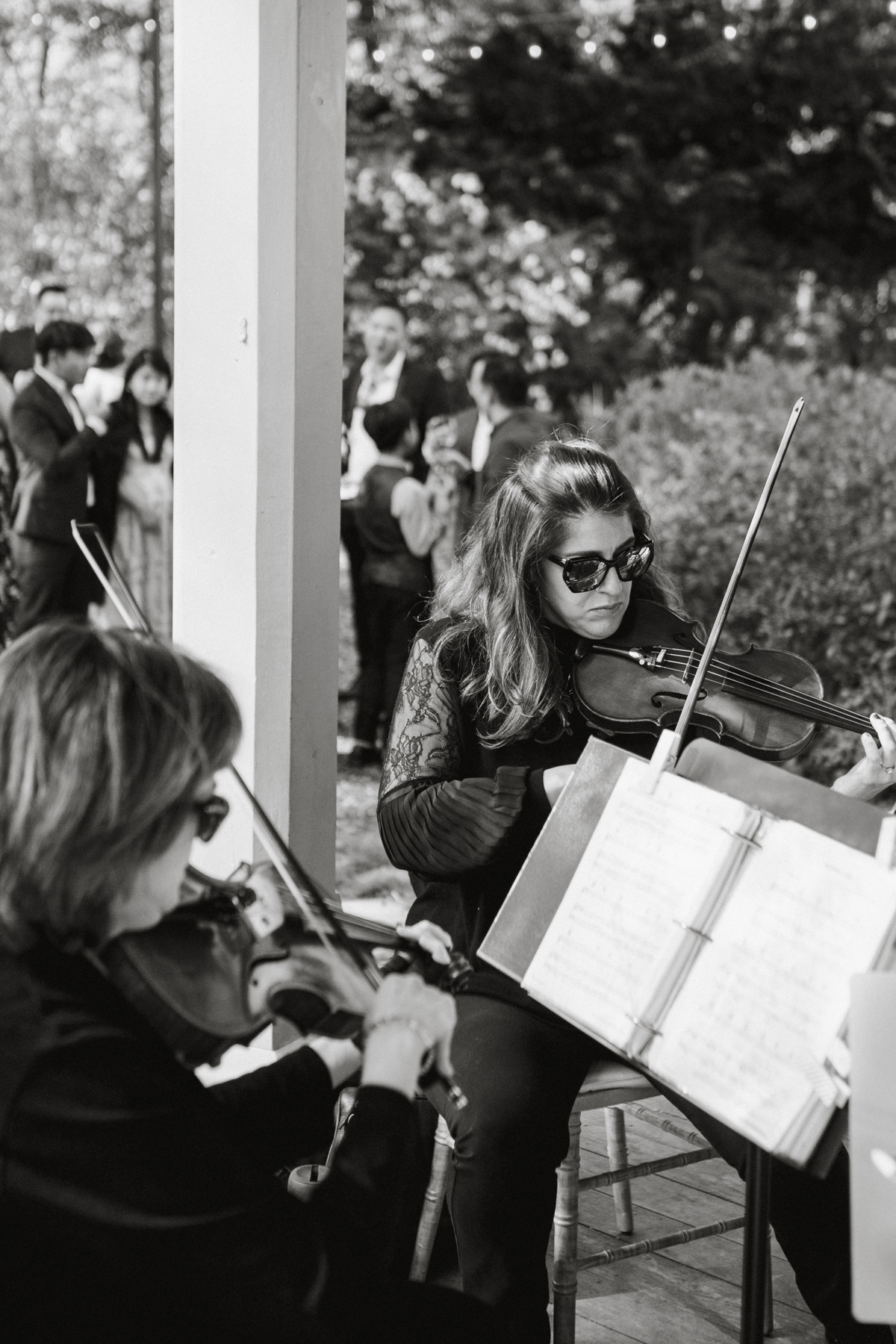 Outdoor violinist at Portico cocktail hour