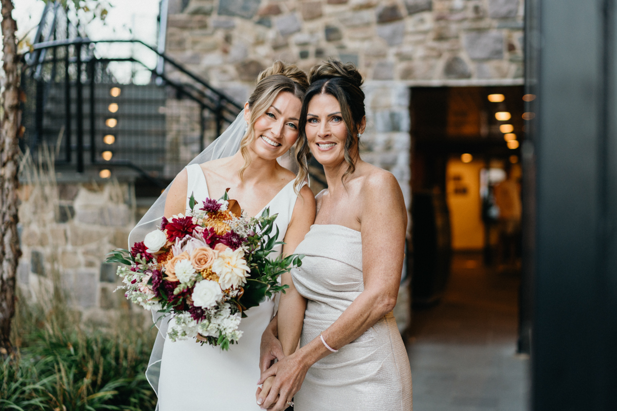 mom walking bride down aisle