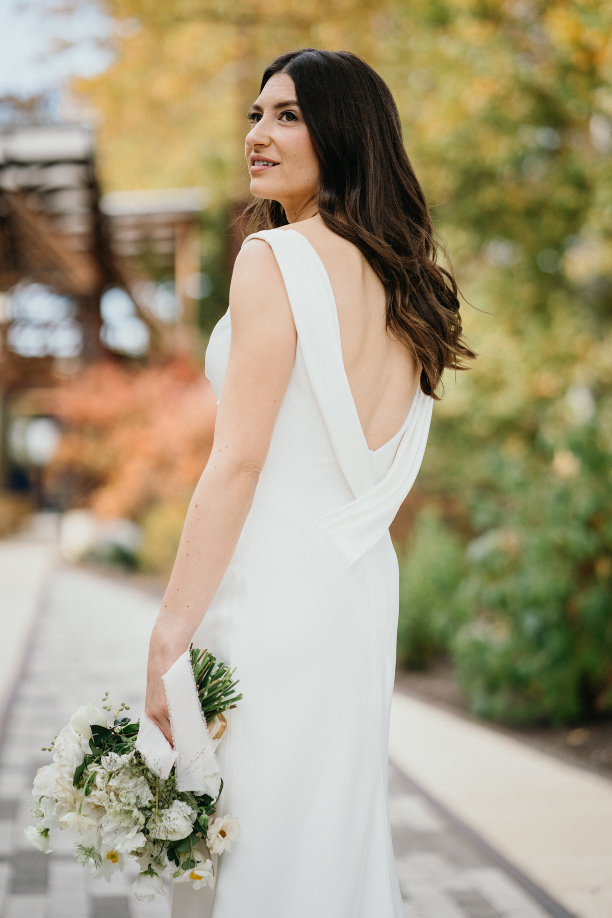 editorial portrait at ironworks wedding with fall foliage