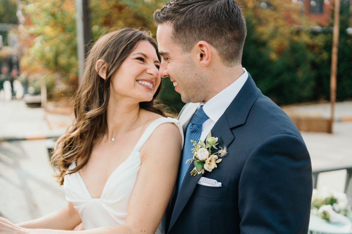 Candid wedding portrait on the bridge at Pencoyd Landing