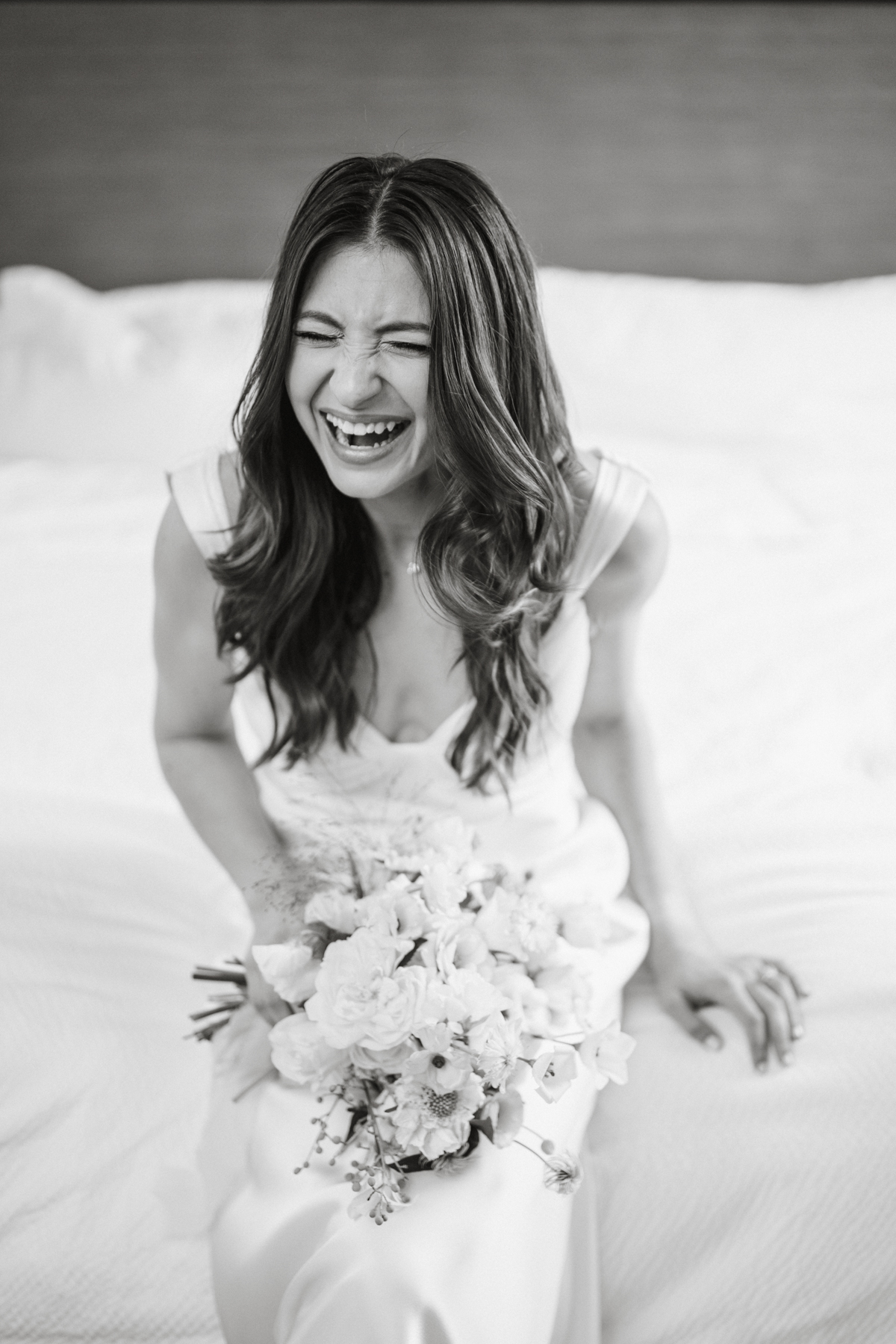 candid of bride on wedding morning by philly photographer