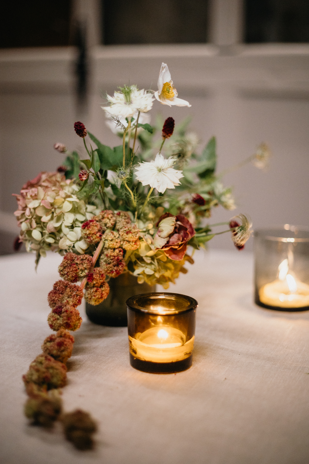 Reception design with clean lines and soft florals at Ironworks