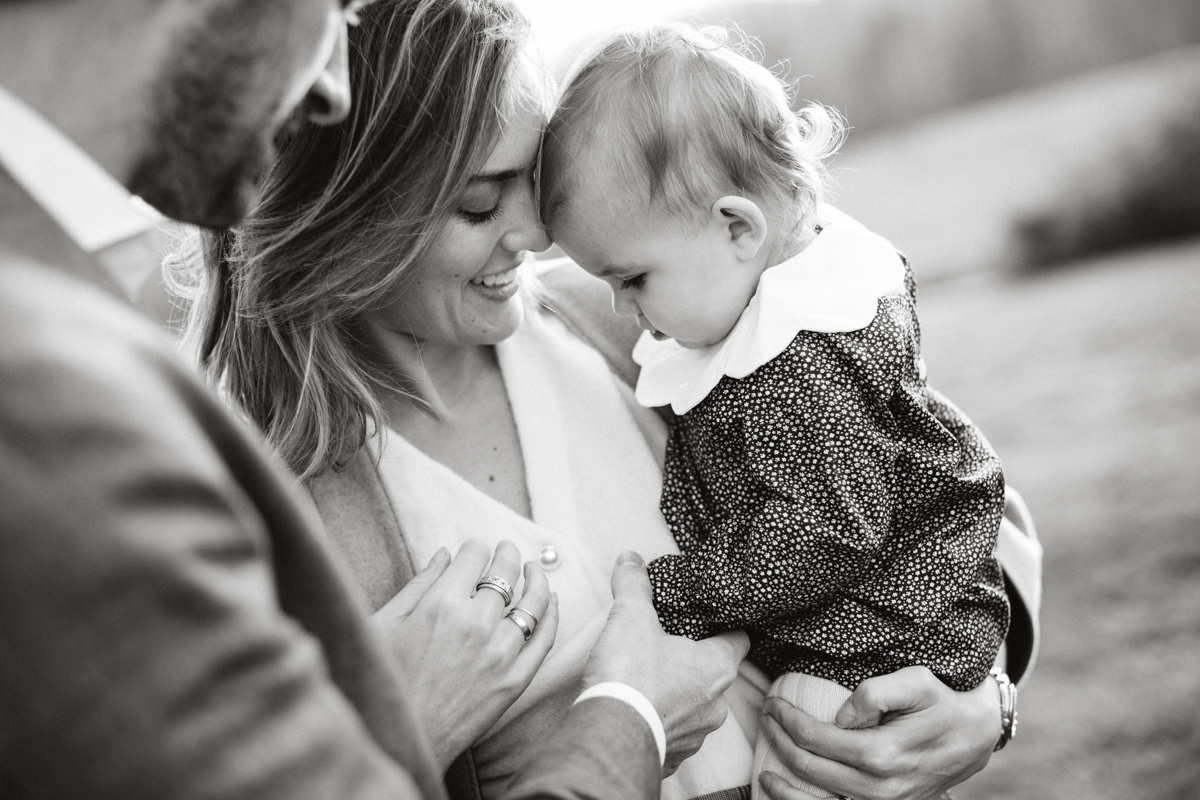Philadelphia family photographer portraits near wooden fence