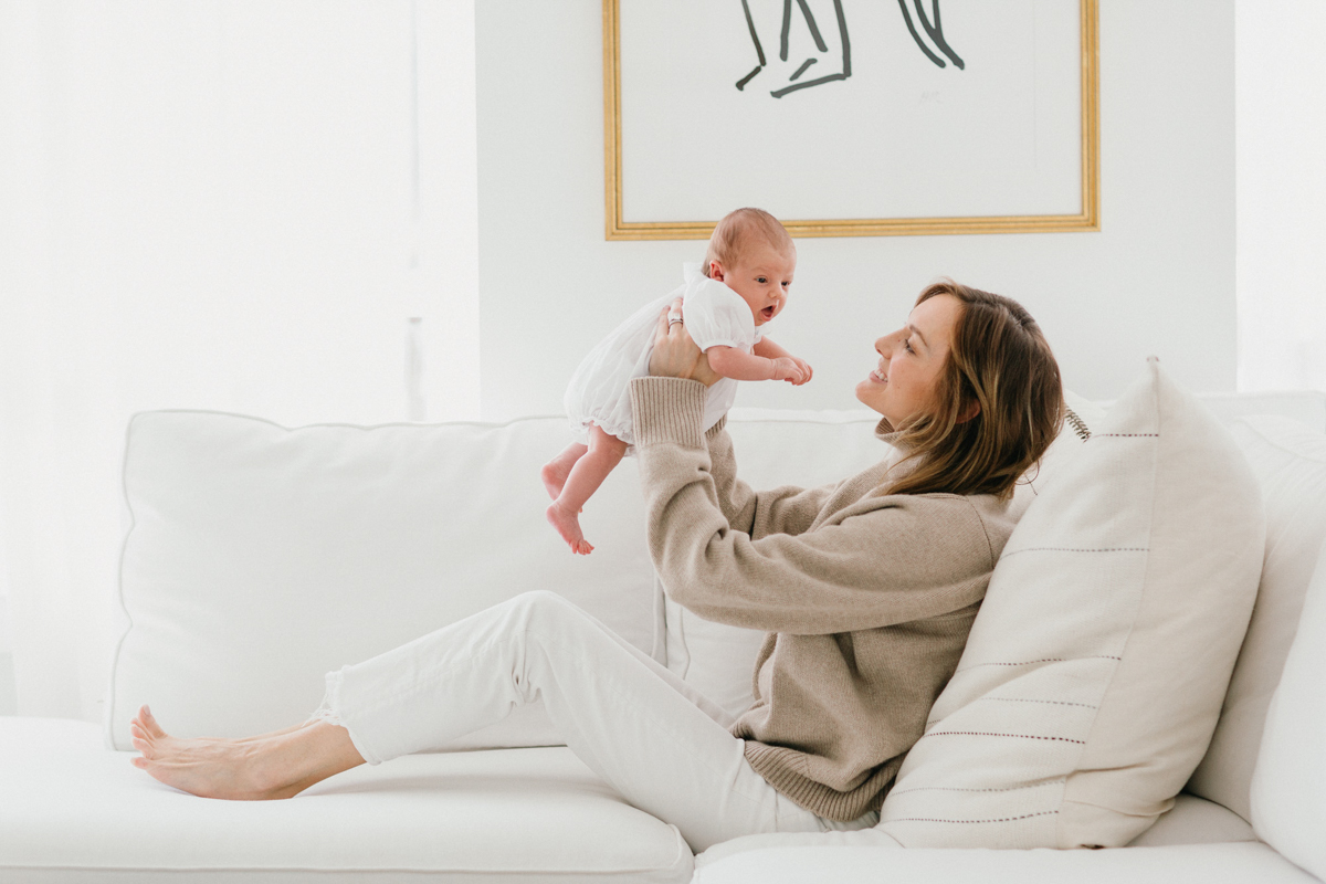 Philly newborn photographer natural light in cozy apartment