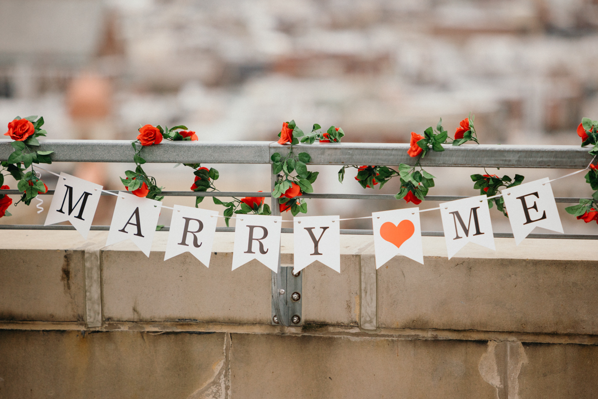 Marry me banner at rooftop proposal in Philadelphia