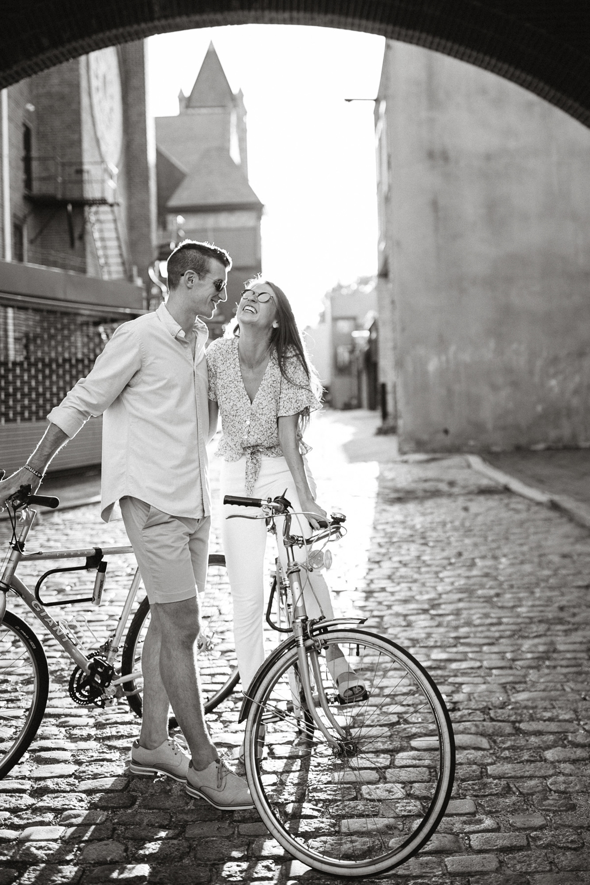 bike riding engagement photos in queen village