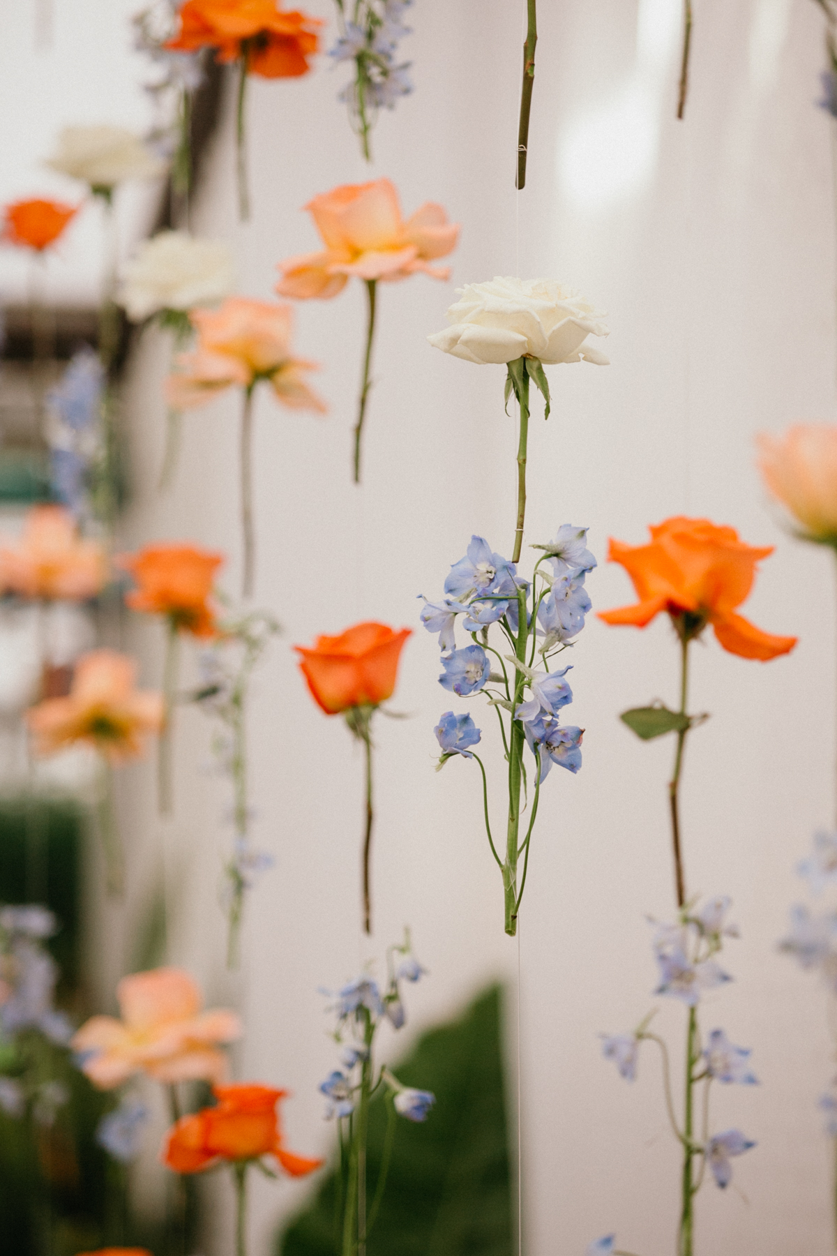 floating flower wall at garden wedding