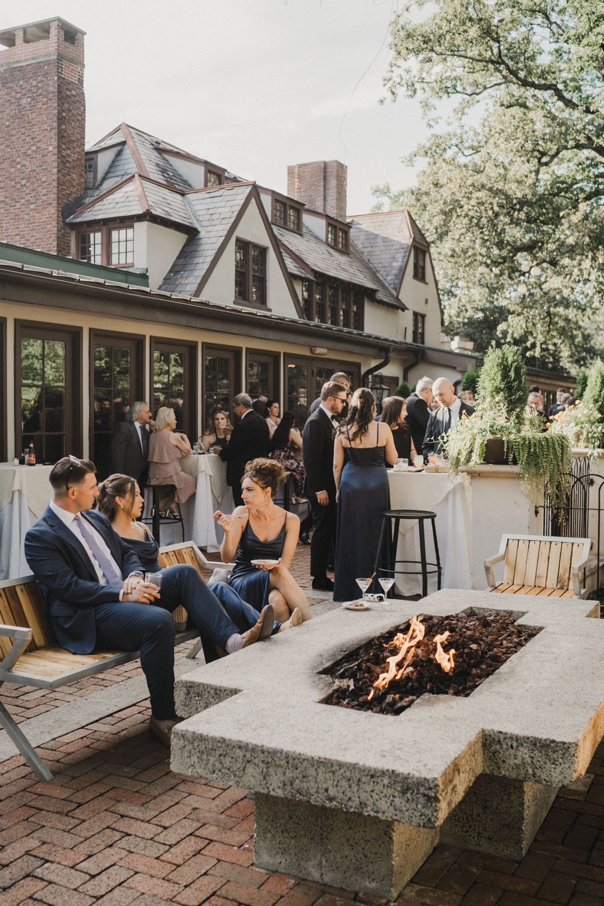 outdoor wedding reception with firepits