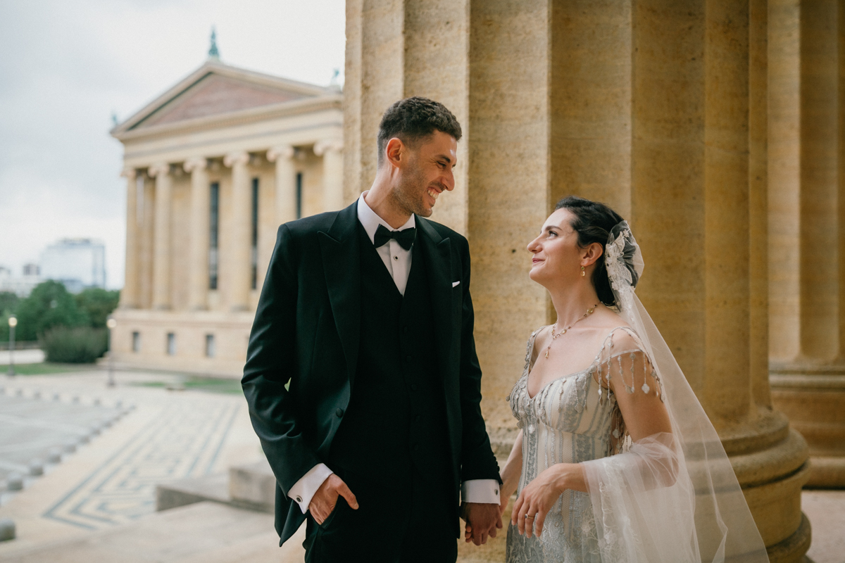 Bride and groom on the steps of the Philadelphia Museum of Art