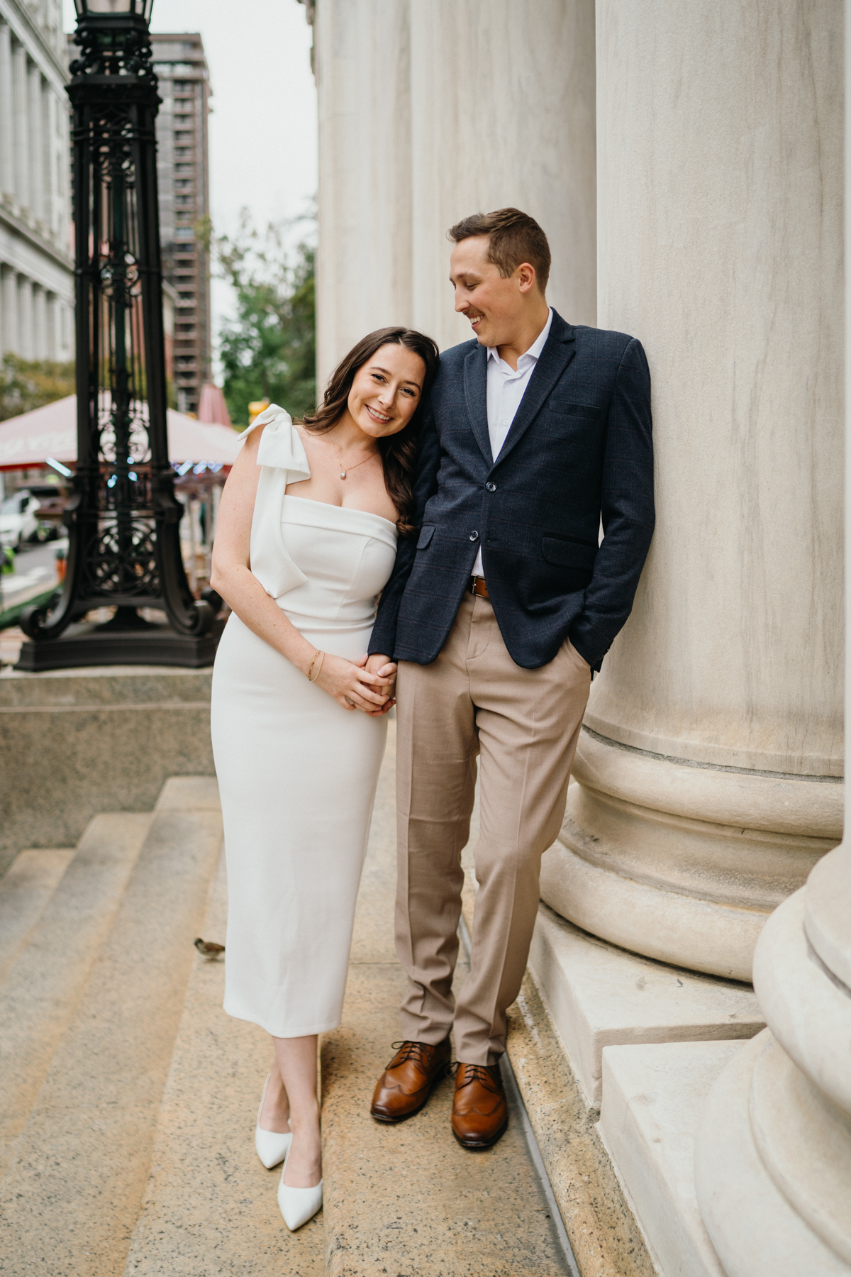 Editorial-style Philadelphia engagement photos by historic columns