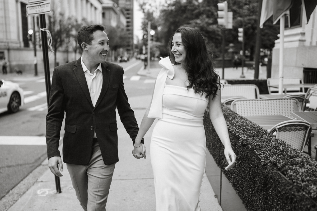 Black and white Philly engagement session walking downtown