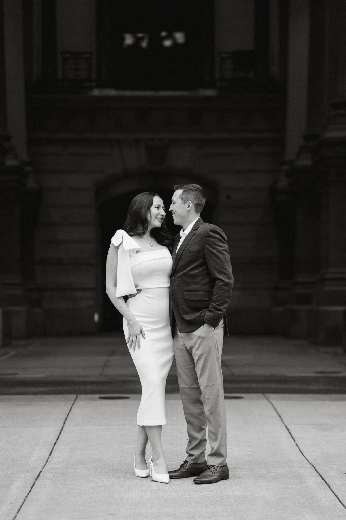 Moody black and white Philly engagement portrait at City Hall