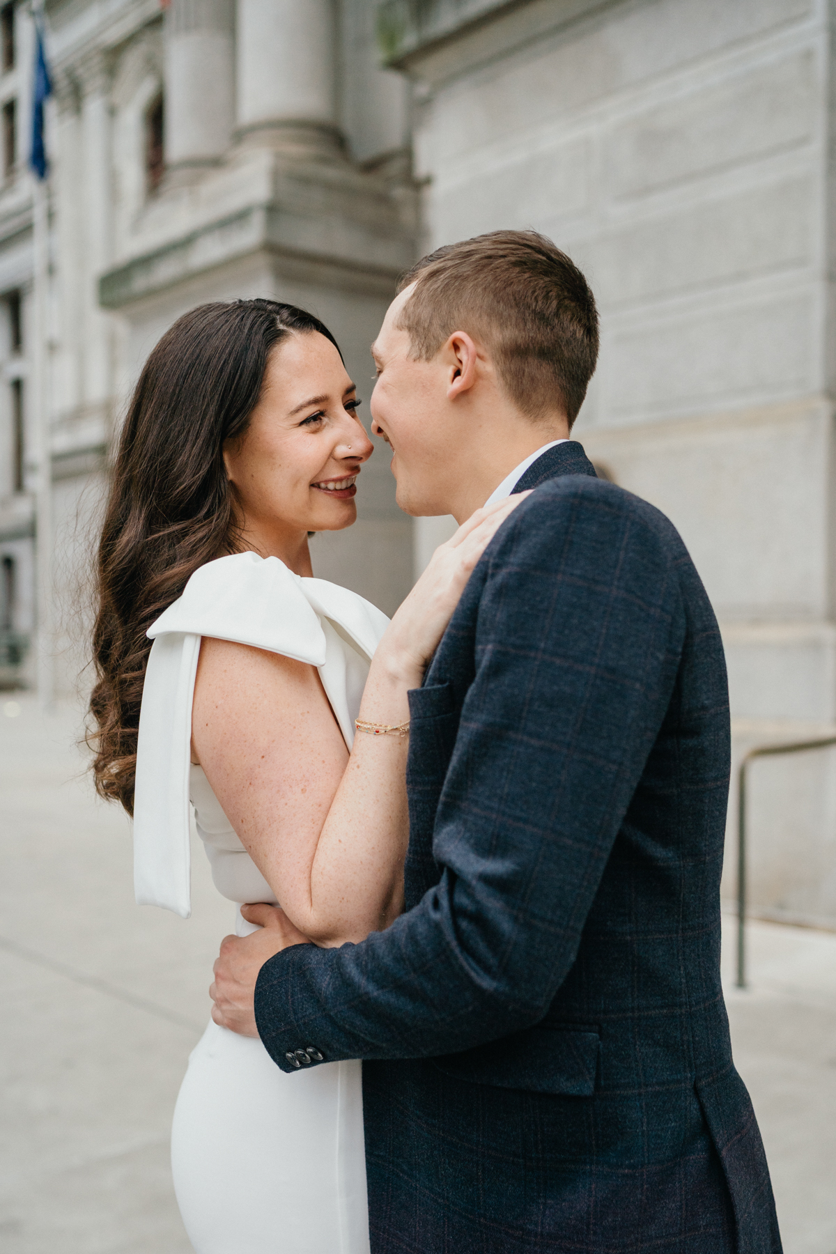 Classic Philadelphia engagement session outside City Hall columns