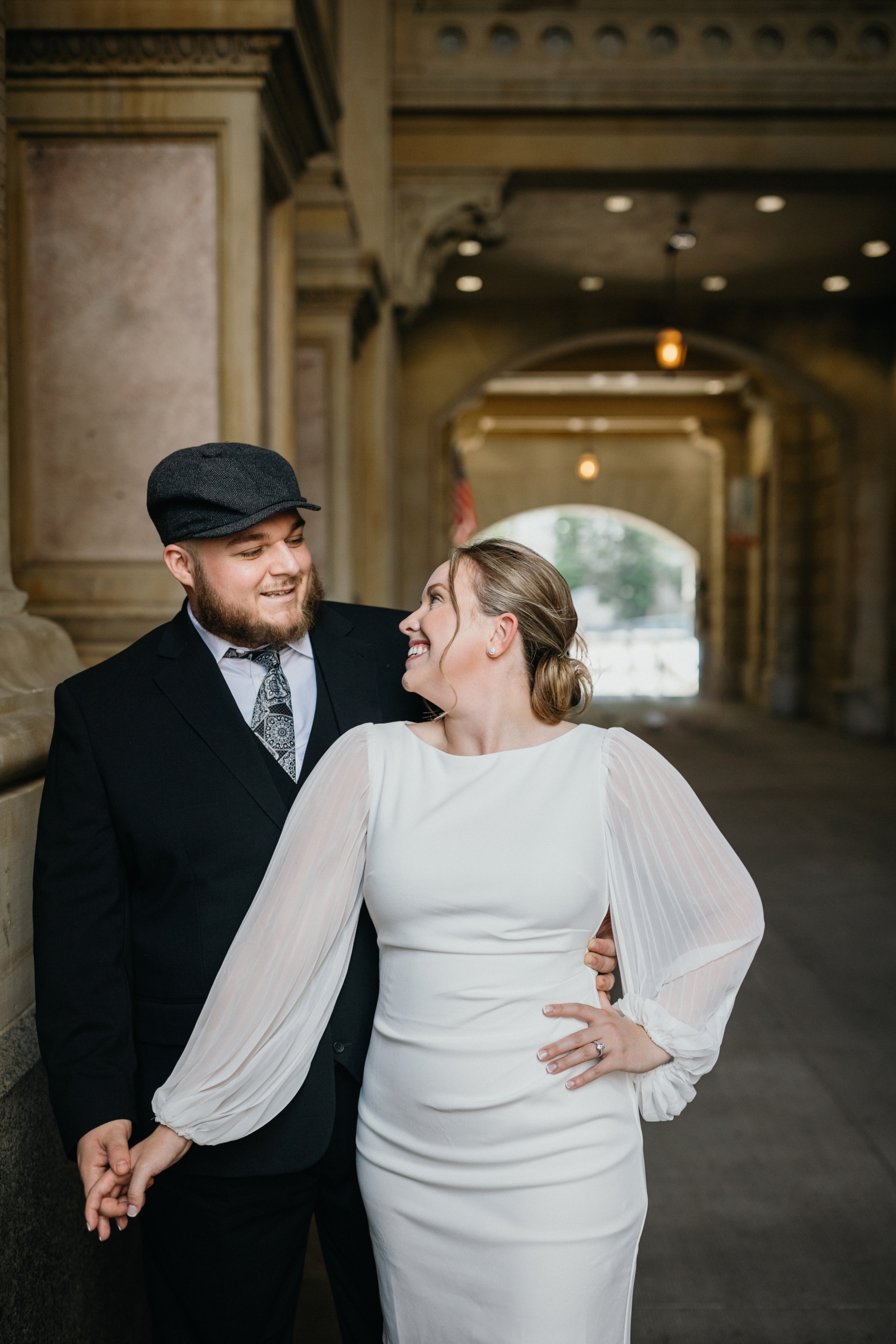 Stylish couple portraits at City Hall from an editorial wedding photographer