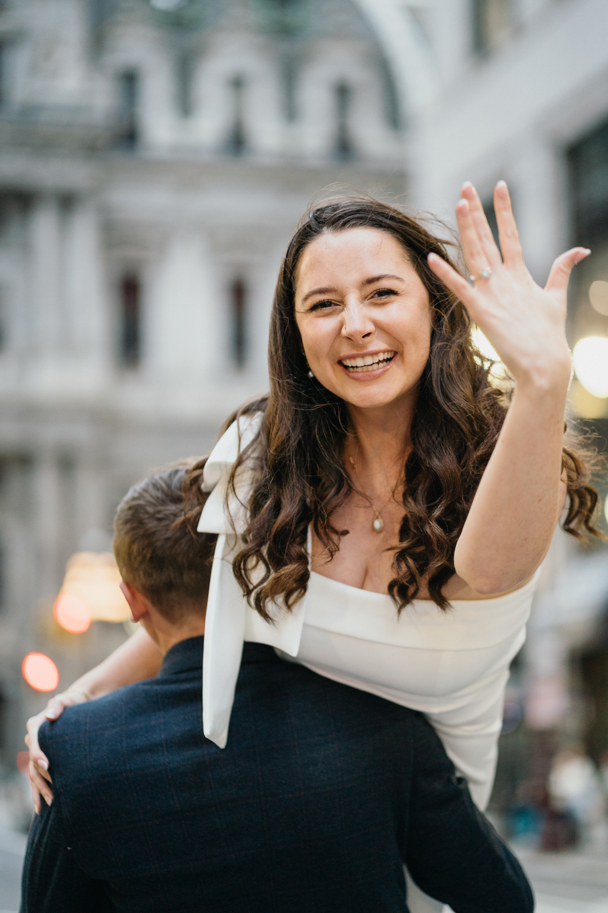 Philly engagement session close-up portrait with City Hall in background