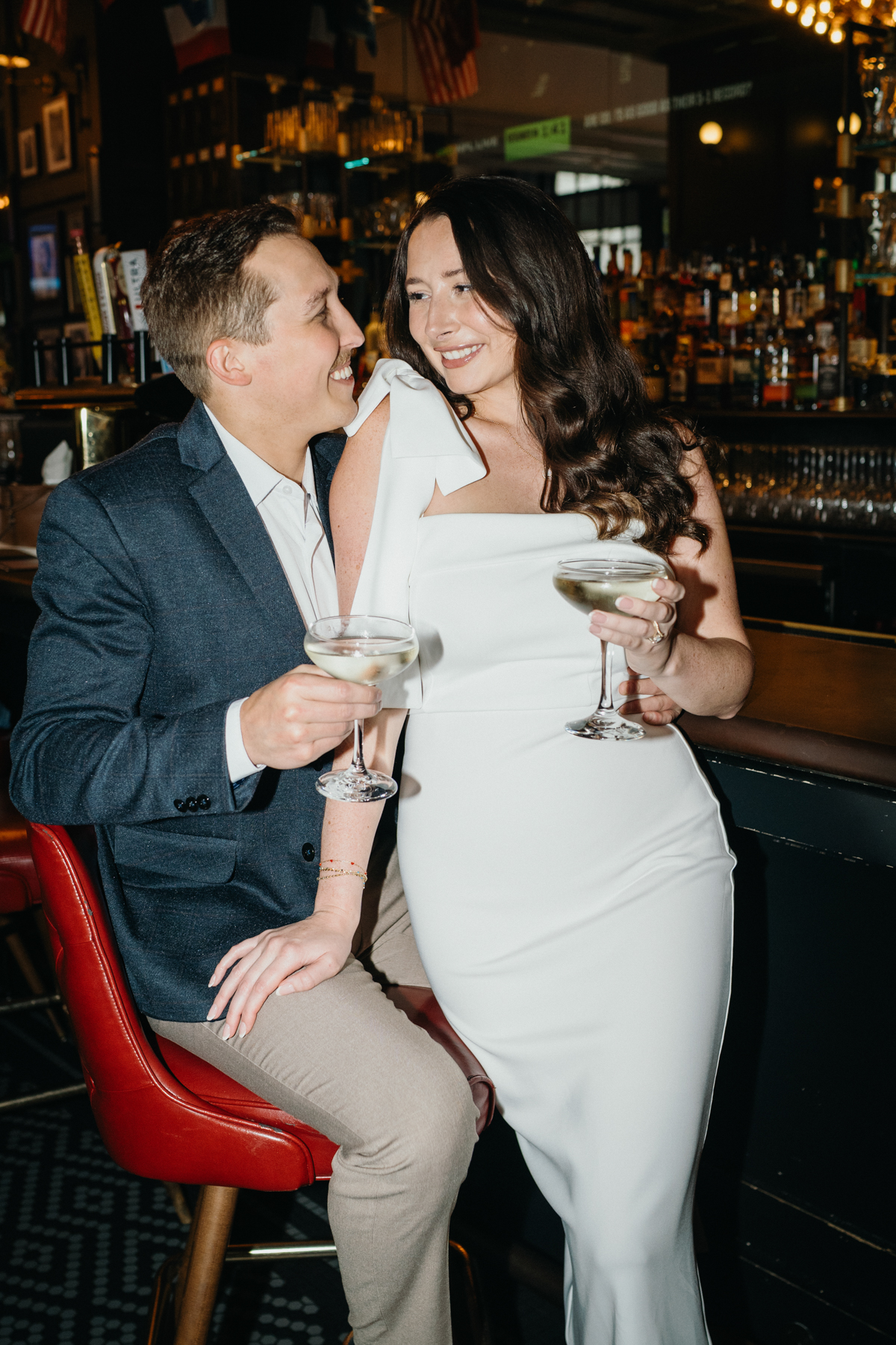 Cozy bar engagement photos in Philadelphia restaurant
