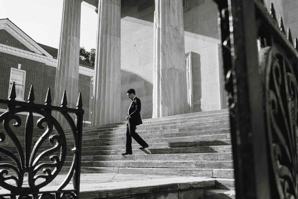 groom framed by columns at the Second Bank Philadelphia