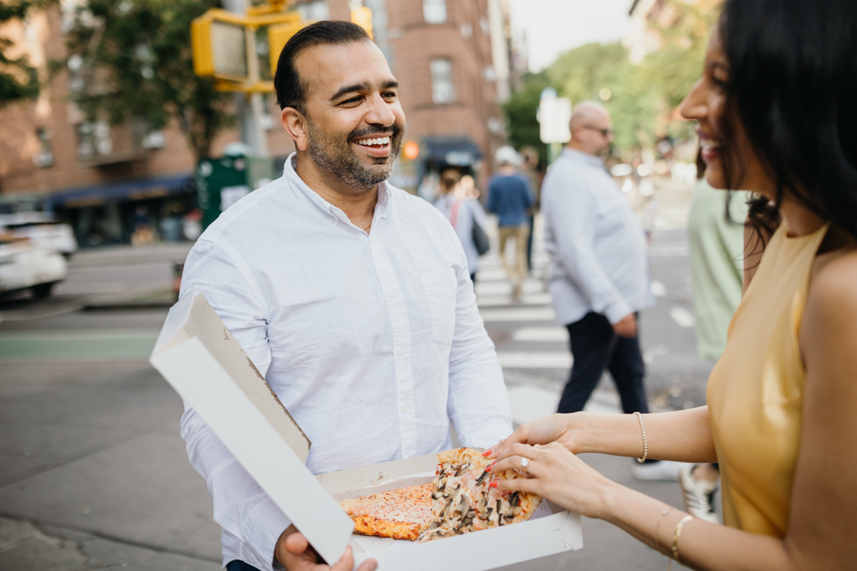 nyc engagement photos at pizza shop