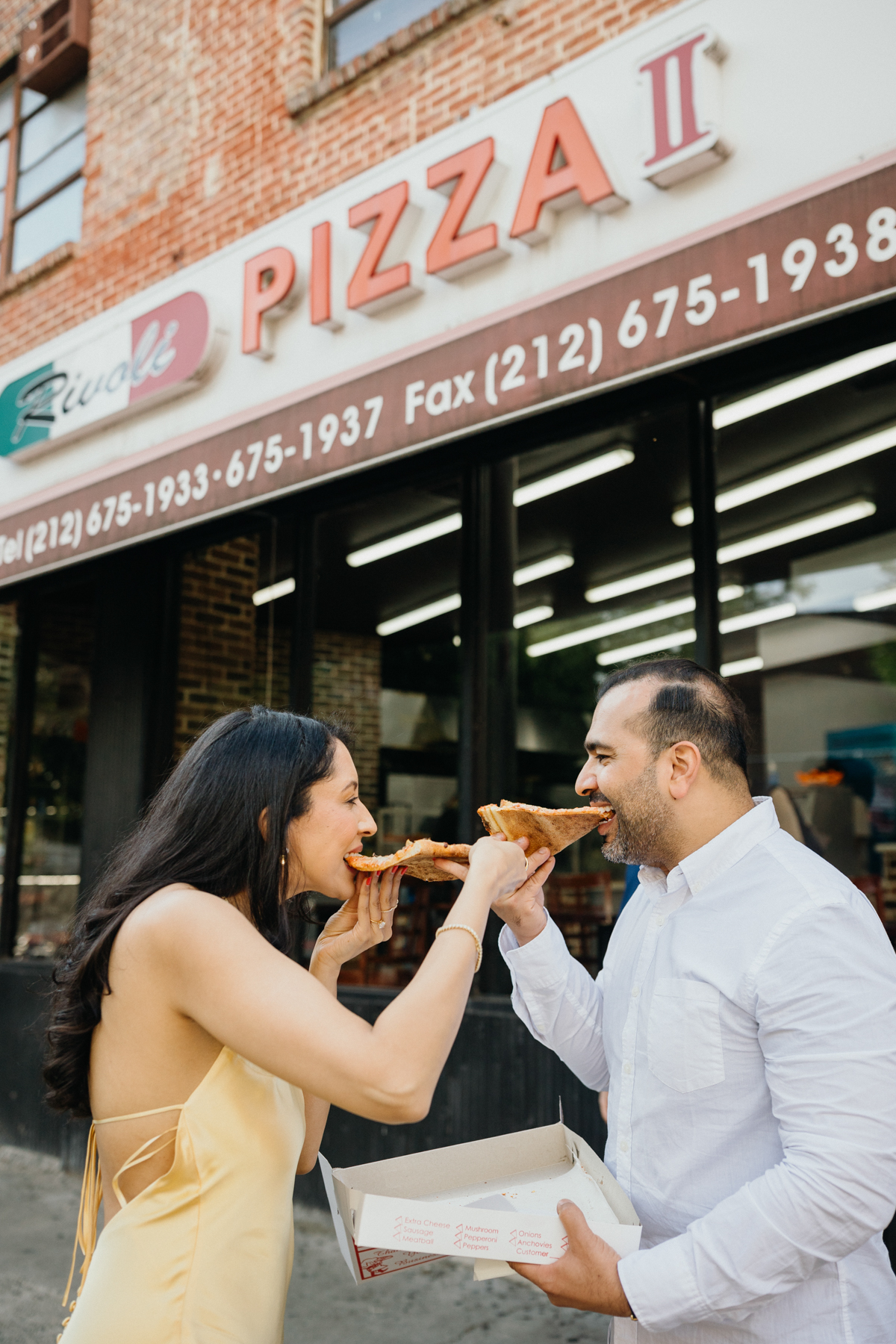 engagement photos with pizza